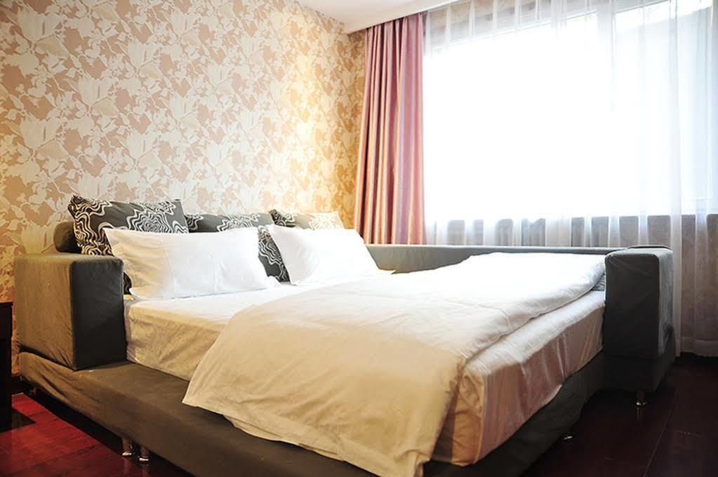 East Sacred Hotel Beijing Bagian luar foto