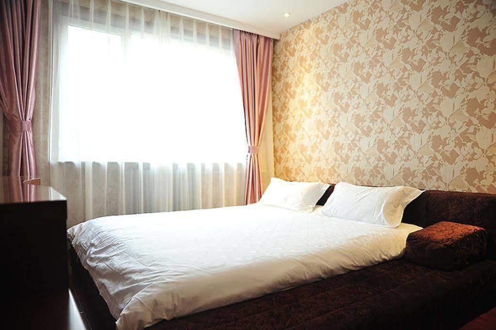 East Sacred Hotel Beijing Bagian luar foto
